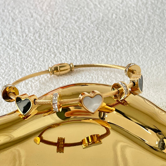 WHITE AND BLACK SHELL HEART BRACELET