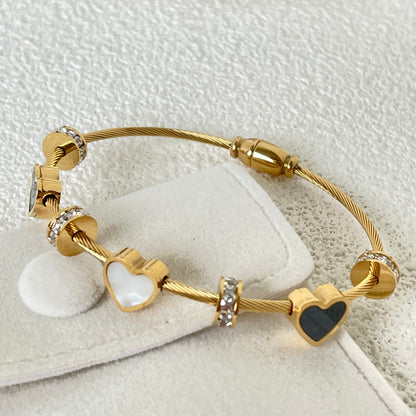 WHITE AND BLACK SHELL HEART BRACELET
